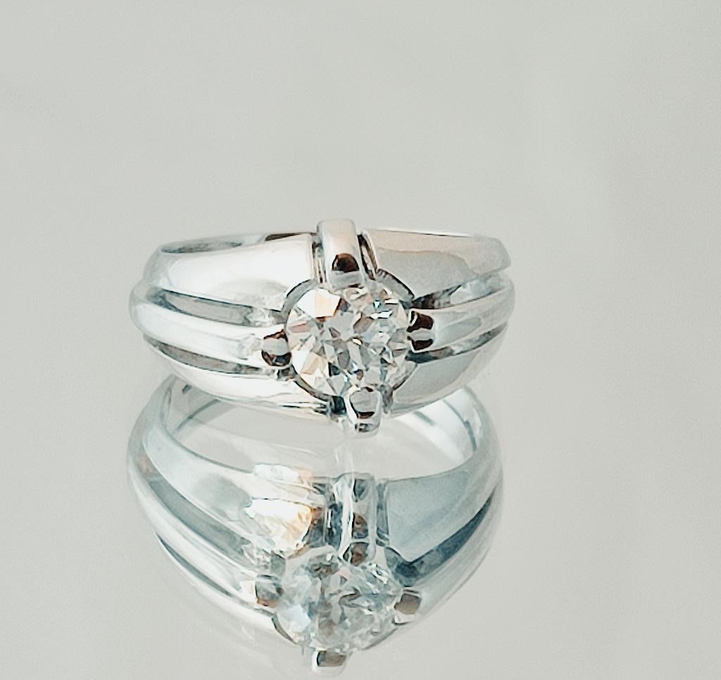 Massieve platinum ring met diamant 0,75kt F/ S1, Ophalen of Verzenden, Met edelsteen, Dame, Goud