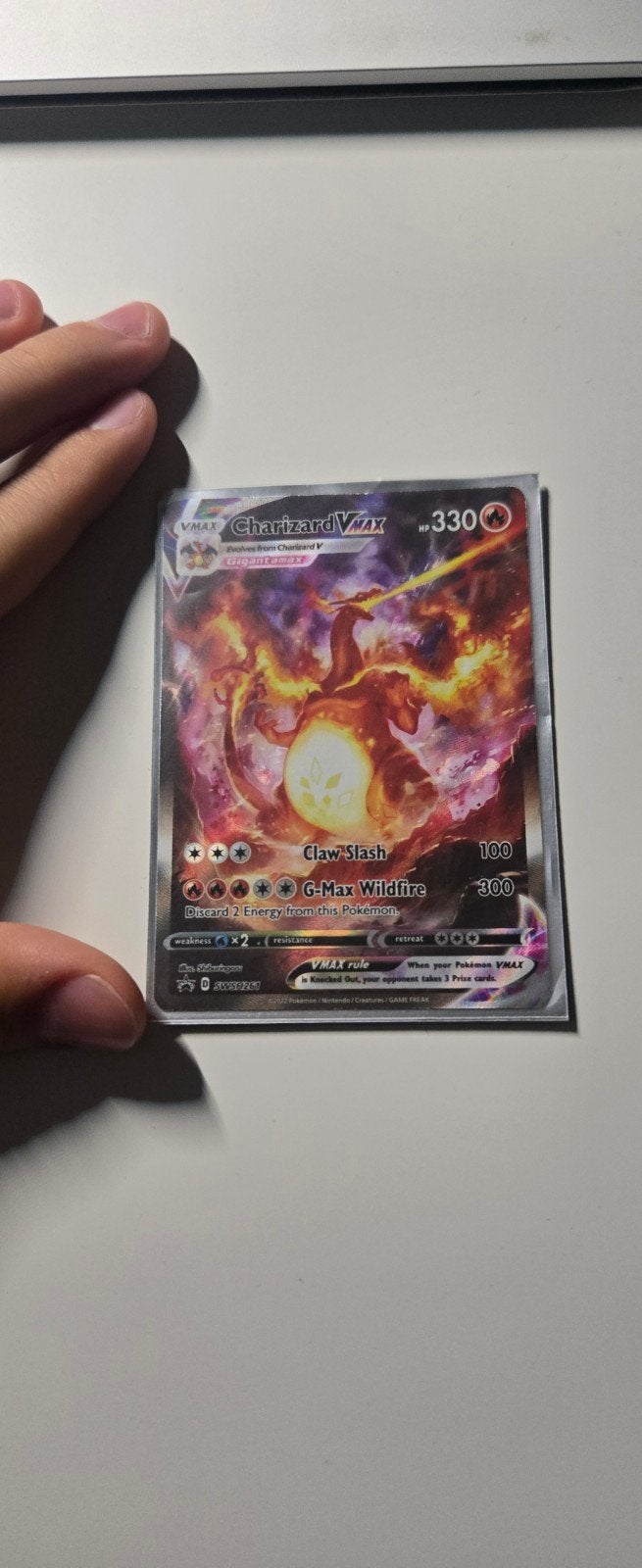 charizard vmax, Ophalen of Verzenden, Zo goed als nieuw