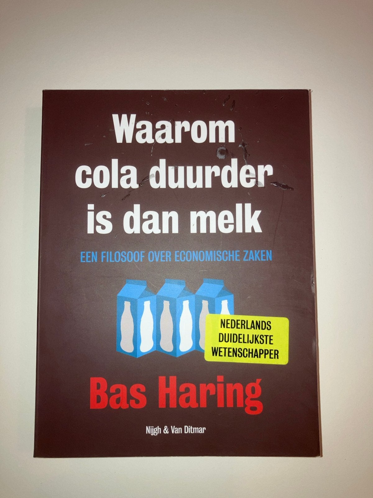 Waarom cola duurder is dan melk - Bas Haring, Ophalen of Verzenden, Zo goed als nieuw, Economie en Marketing