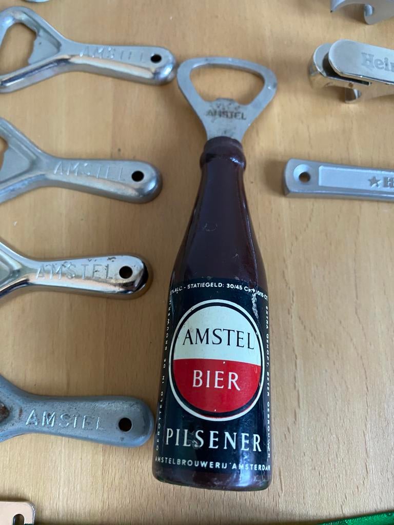 Amstel bier flessen openers ook Heineken en 1 Grolsch, Ophalen of Verzenden, Gebruikt, Flesopener, Amstel