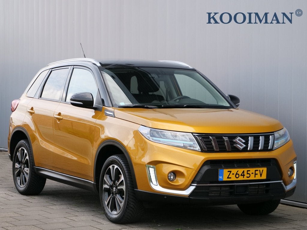 Suzuki Vitara 1.4 Boosterjet Style Smart Hybrid 130Pk Camera, Auto's, Suzuki, Gebruikt, 4 cilinders, Leder en Stof, 49 €/maand