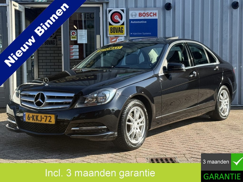 Mercedes-Benz C-Klasse 180 Business Class Avantgarde | AUTOM, Auto's, Euro 5, Achterwielaandrijving, Zwart, Leder en Stof