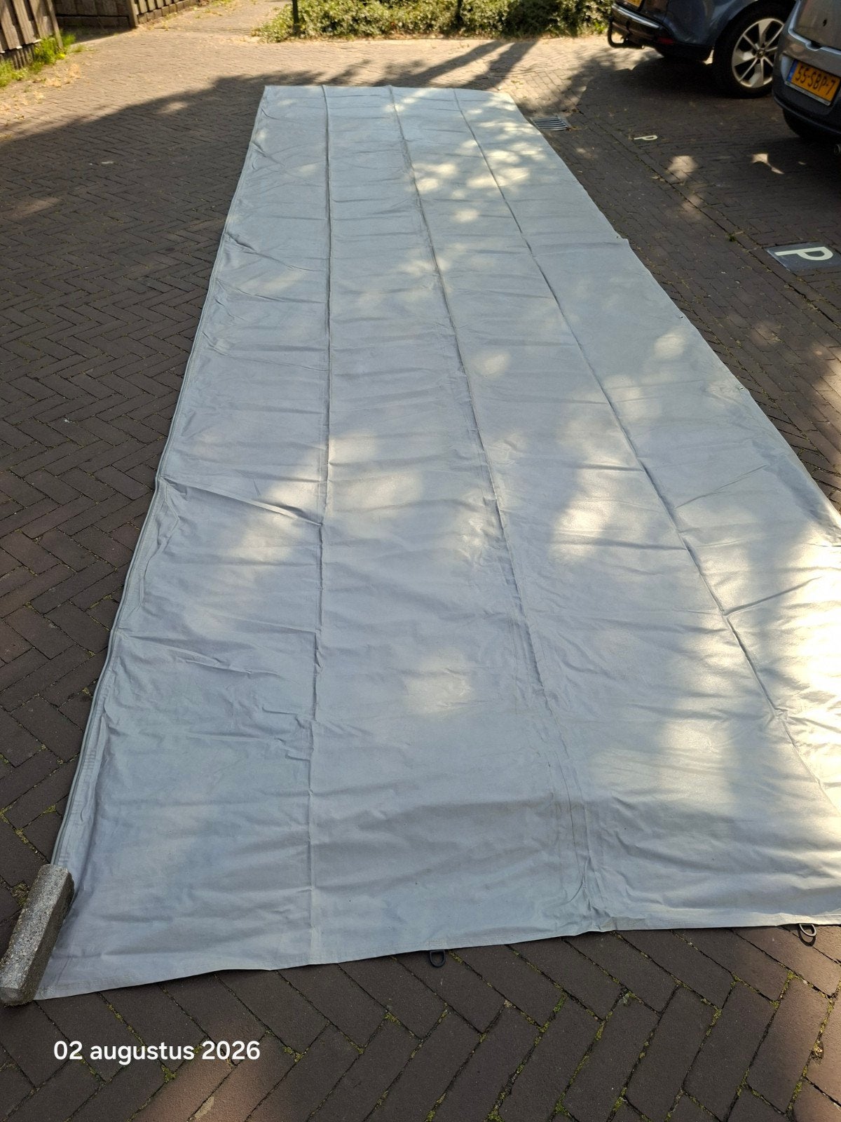 luifel met stokken, Ophalen, Zo goed als nieuw