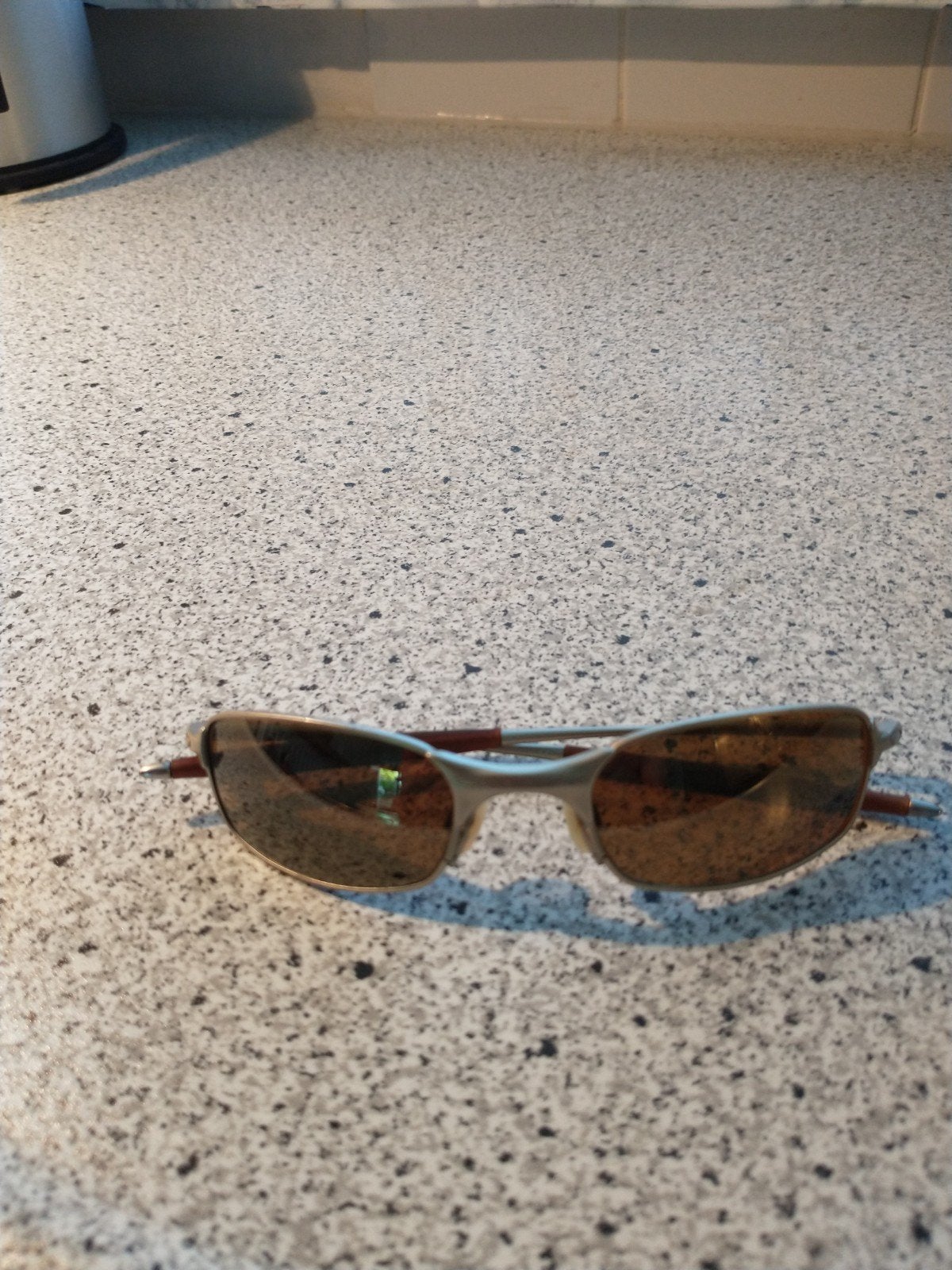 OAKLEY E-WIRE GOLD IRRIDIUM, Ophalen of Verzenden, Zo goed als nieuw, Oakley