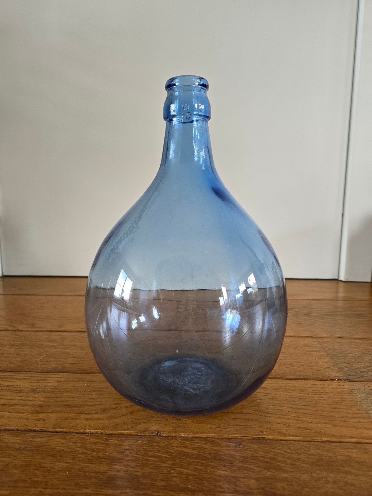 Brocante licht blauwe gistfles, Ophalen