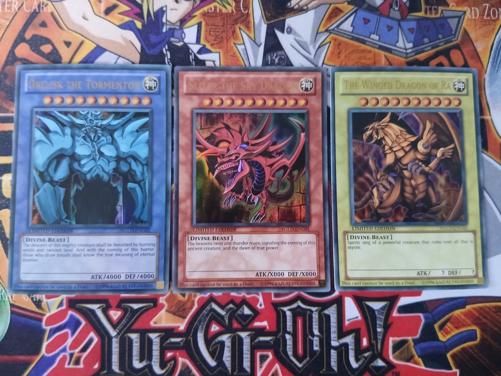 Egyptian God Set - Ultra Rare YGLD - Yu-Gi-Oh, Ophalen of Verzenden, Zo goed als nieuw, Meerdere kaarten, Foil