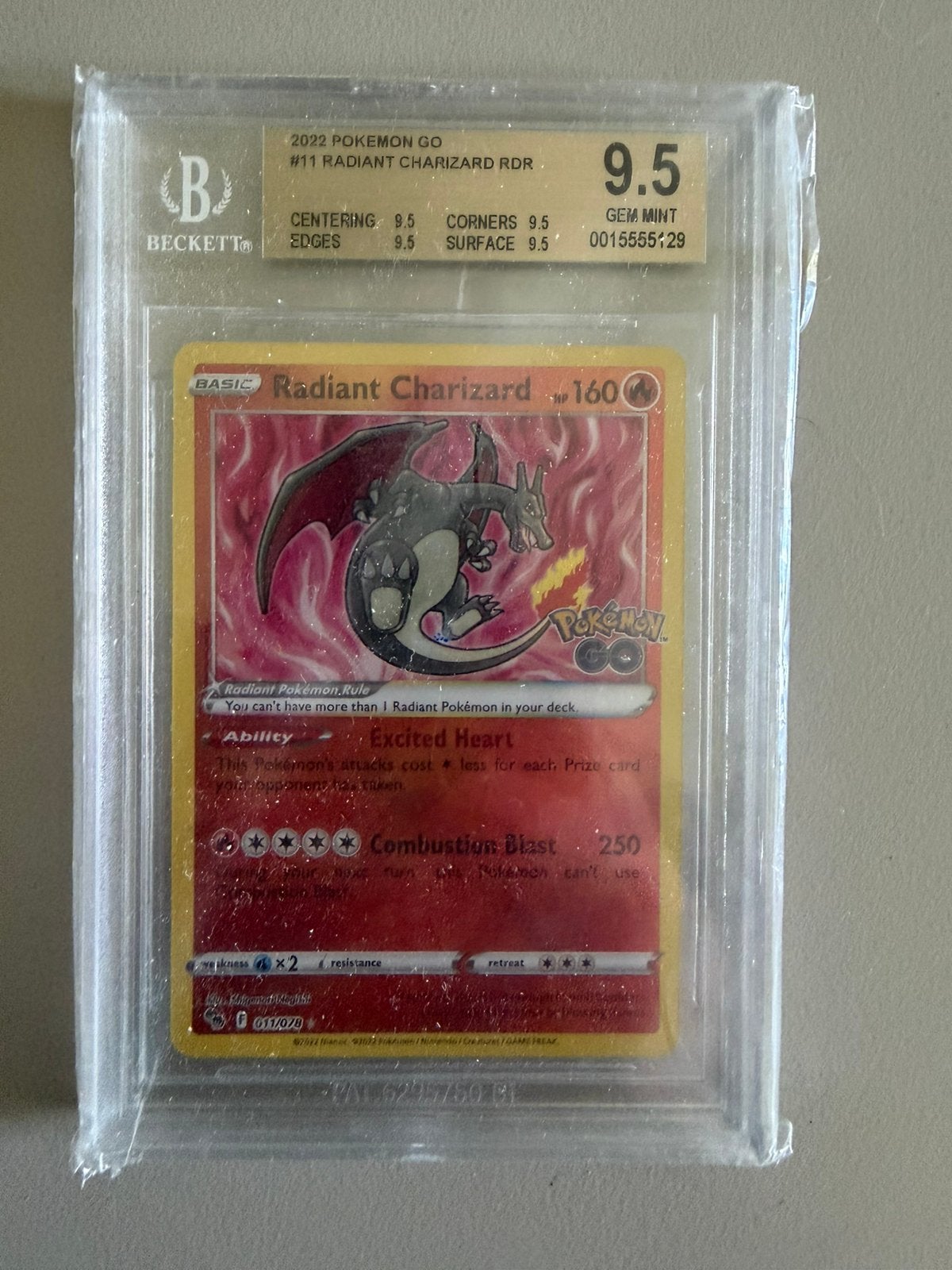 Radiant Charizard uit de Pokémon GO set (2022)  011/078, Ophalen of Verzenden, Zo goed als nieuw