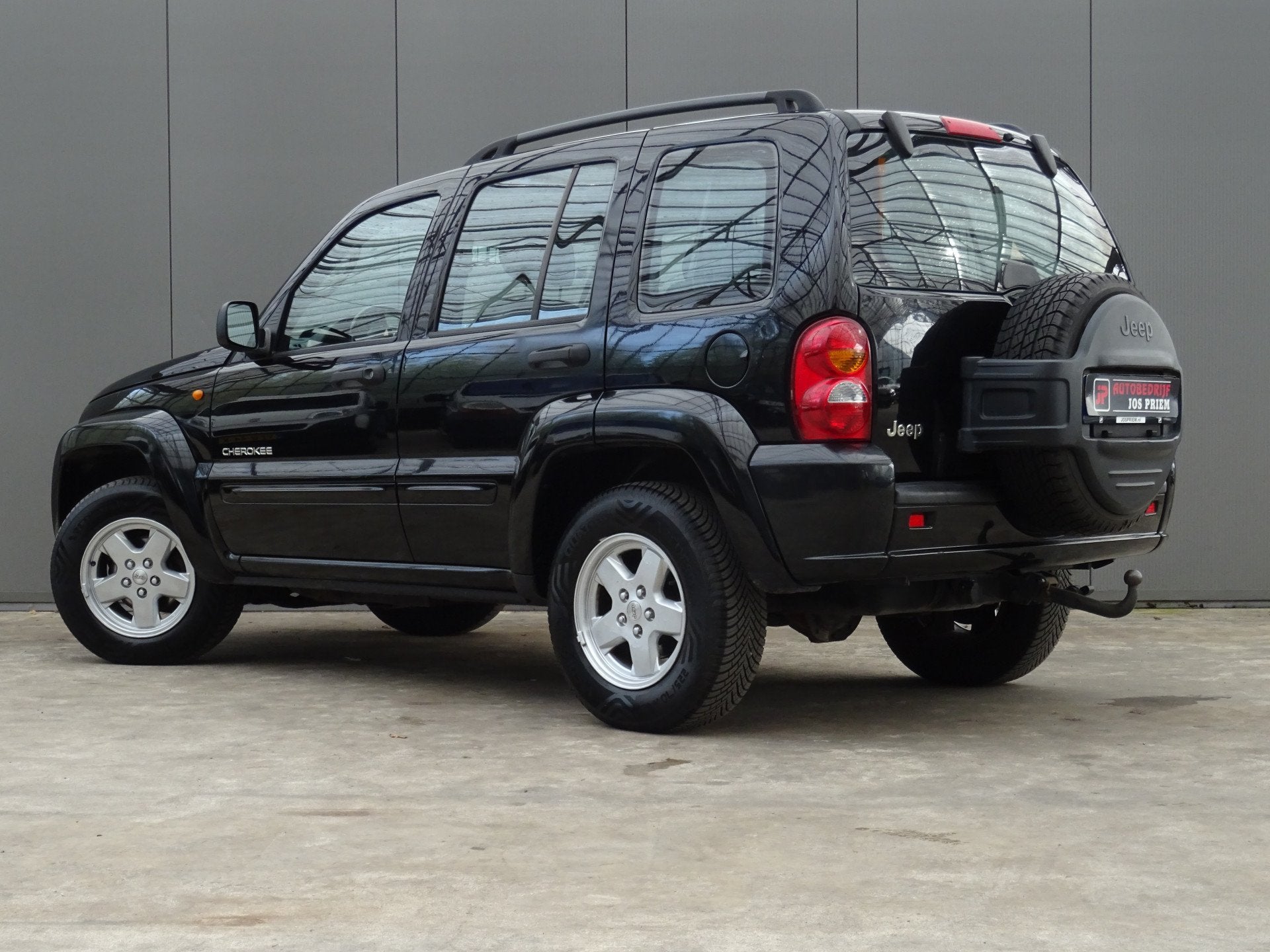 Jeep Cherokee 3.7i V6 limted * LEER * TREKHAAK * 4 SEIZOENSB, Auto's, Automaat, 3700 cc, Gebruikt, Zwart