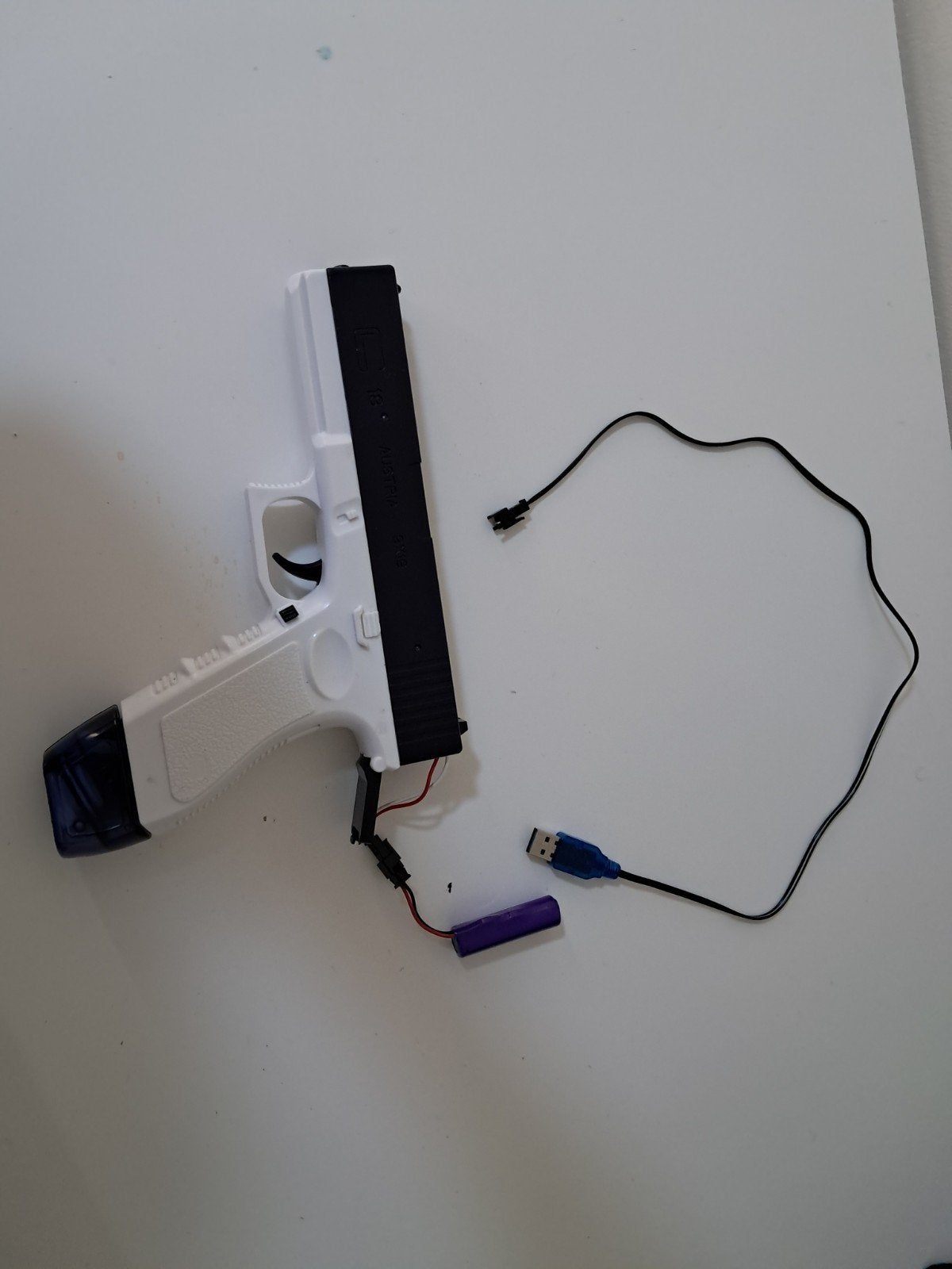 Elektrisch waterpistool met batterij en oplader, Ophalen of Verzenden, Gebruikt