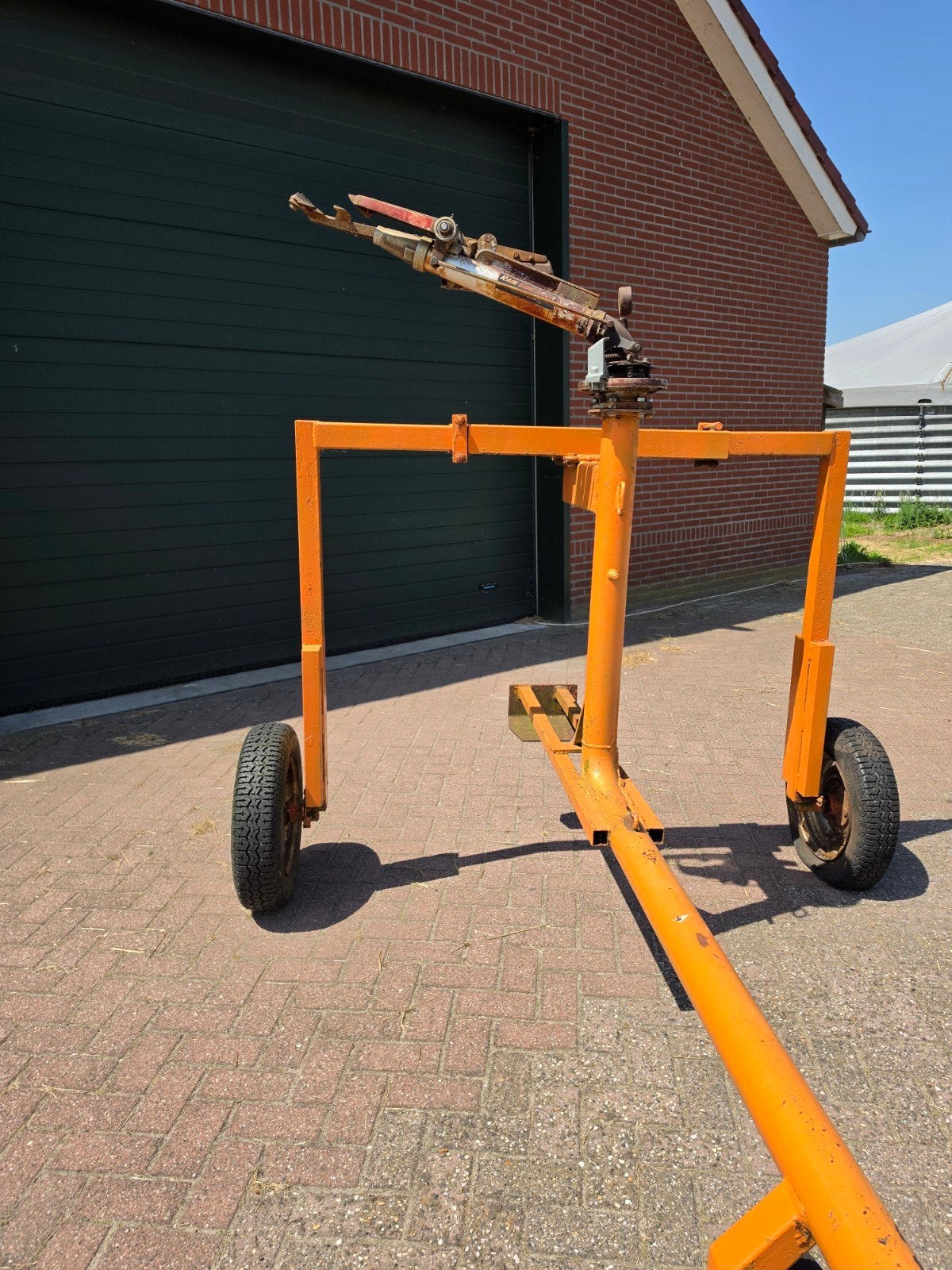 Sproeiwagen met Rain Bird sproeikanon, Ophalen