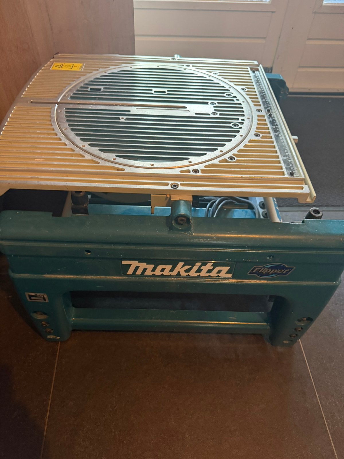 Makita flipper lf 1000, Doe-het-zelf en Verbouw, Ophalen, 70 mm of meer, Zo goed als nieuw, Afkortzaag