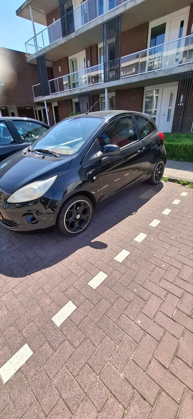 Ford Ka 1.2 51KW 2009 Zwart, Voorwielaandrijving, Stof, 4 cilinders, 4 stoelen