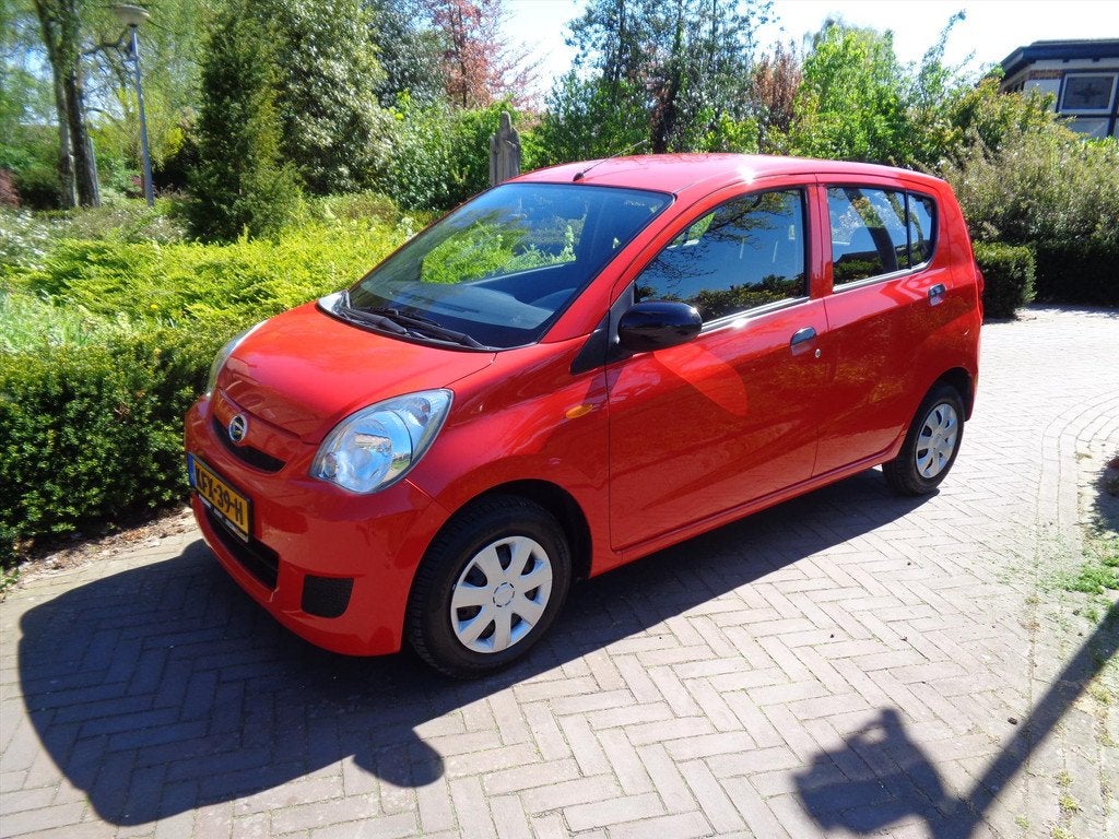 DAIHATSU Cuore 1.0 51KW 5D Comfort bij Daihatsu dealer met 1, Auto's, Automaat, 12 maanden, Stof, Zwart