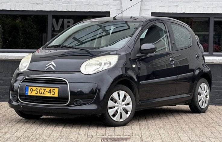 Citroën C1 1.0 5-DRS 2010 Zwart, Auto's, Voorwielaandrijving, Euro 5, Stof, 4 stoelen