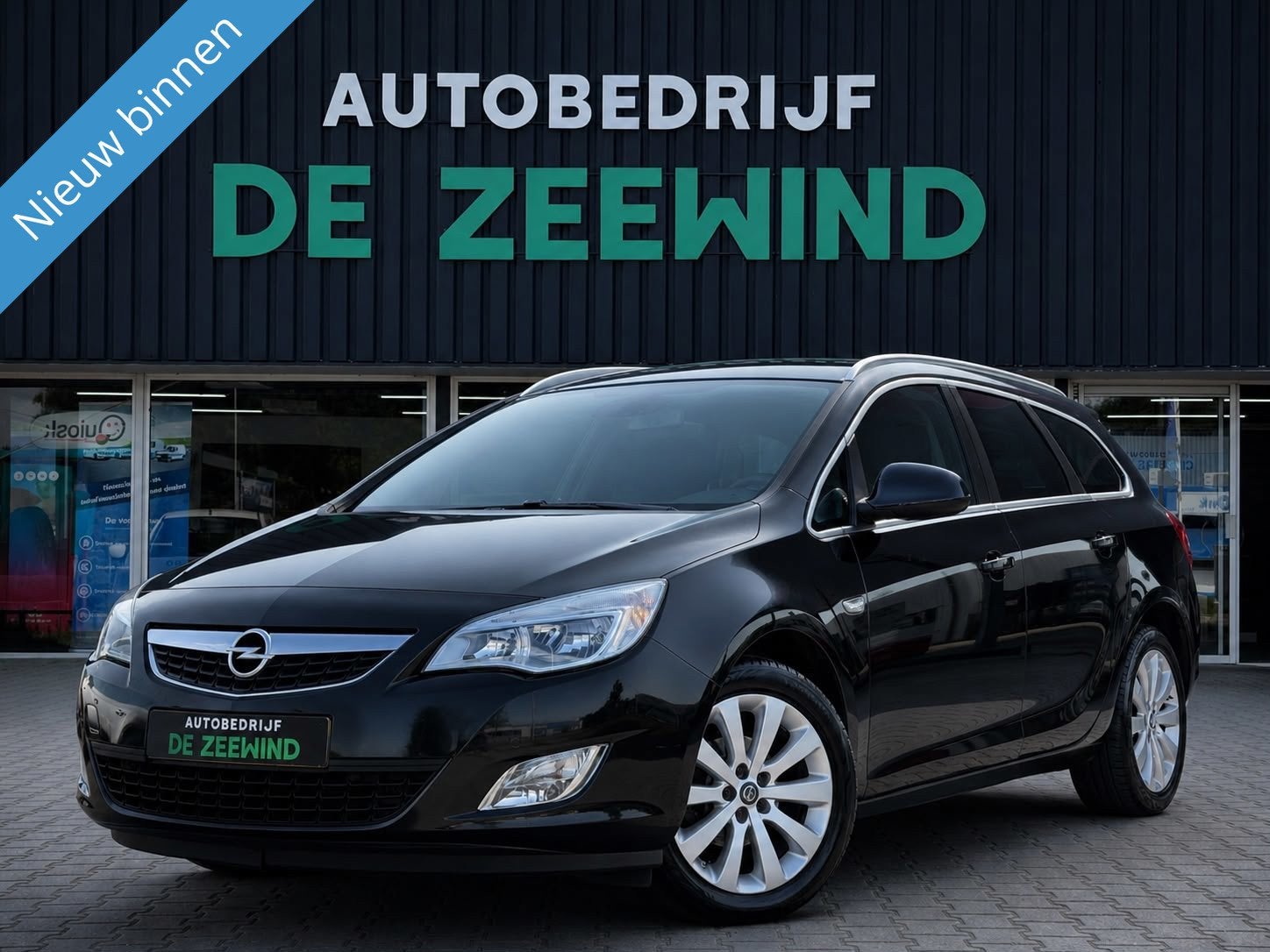 Opel Astra Sports Tourer 1.4 Cosmo, Auto's, Voorwielaandrijving, Euro 5, 101 pk, Gebruikt