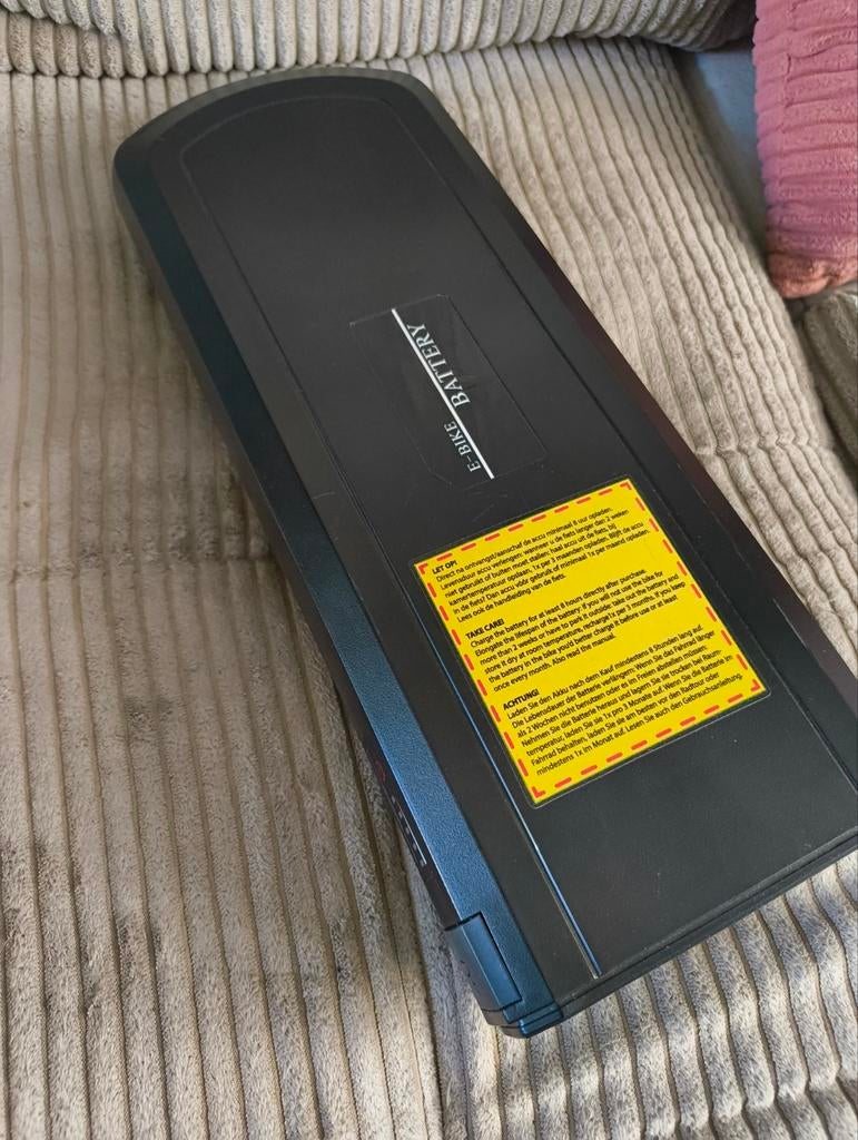 Accu en adapter Phylion, Fietsen en Brommers, Ophalen, Gebruikt