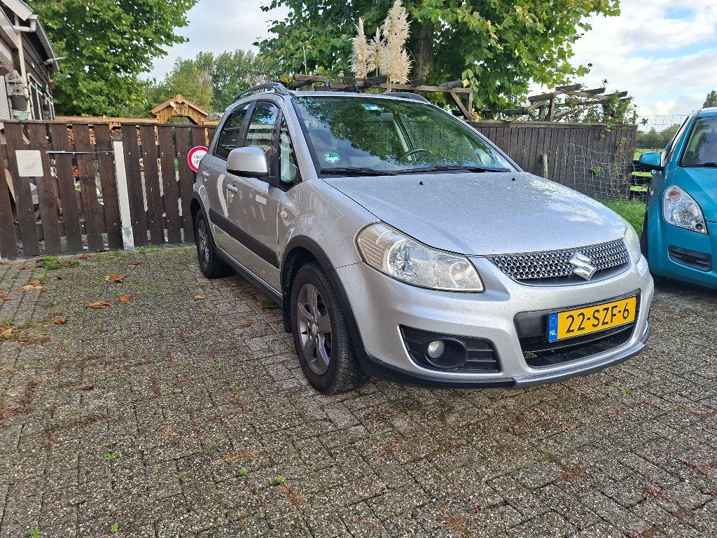 Suzuki SX4 1.6 LIMITED 2012, Auto's, 4 cilinders, Alcantara, 49 €/maand, Origineel Nederlands