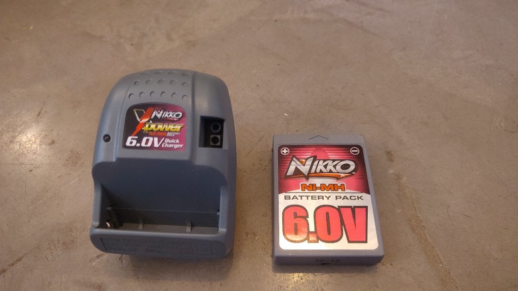 Nikko 6.0V accu met lader, Elektro, Gebruikt, Ophalen of Verzenden, Onderdeel