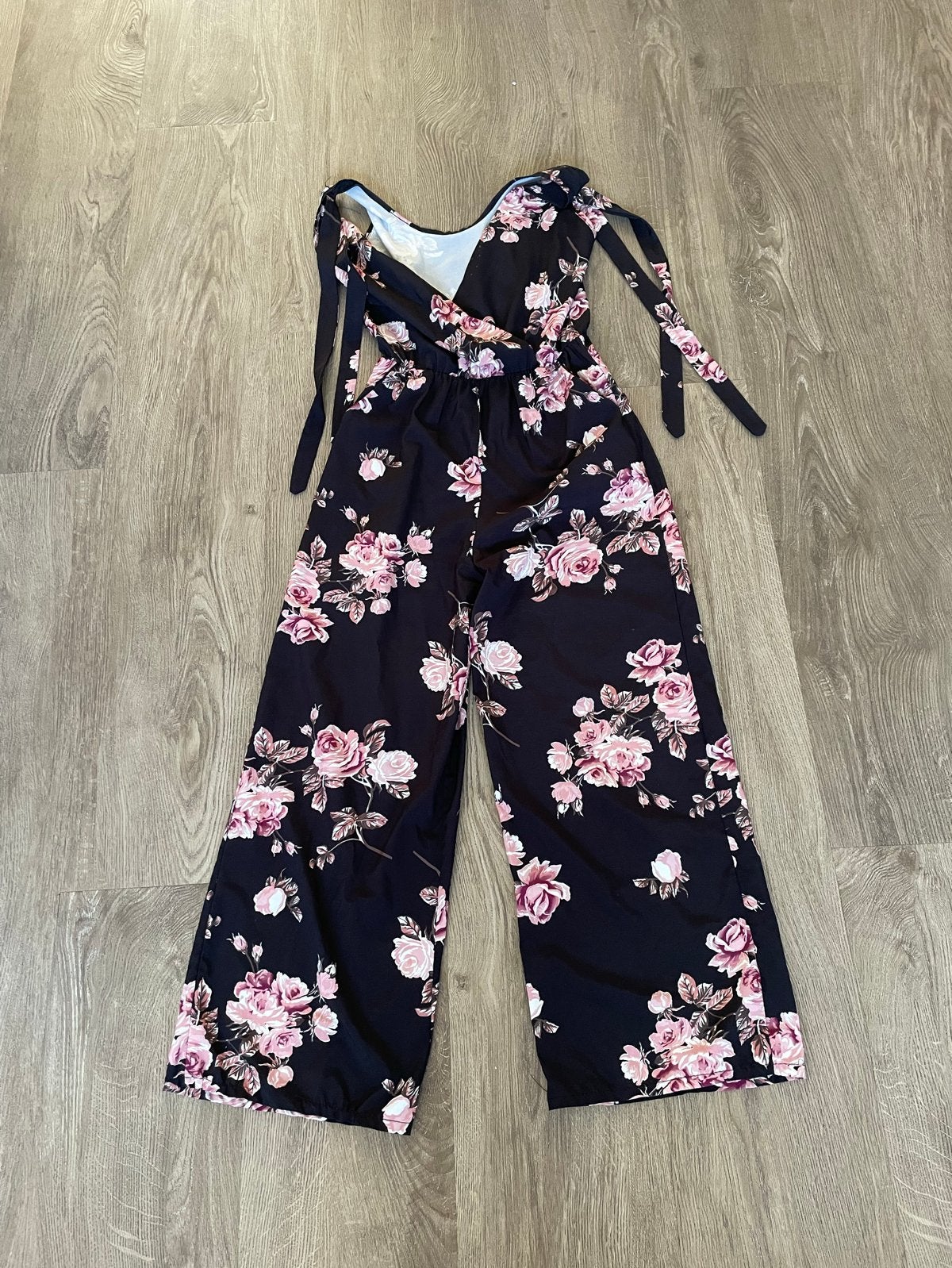 Zwarte jumpsuit met roze bloemenprint maat S, Verzenden, Gedragen, Maat 36 (S), Zwart