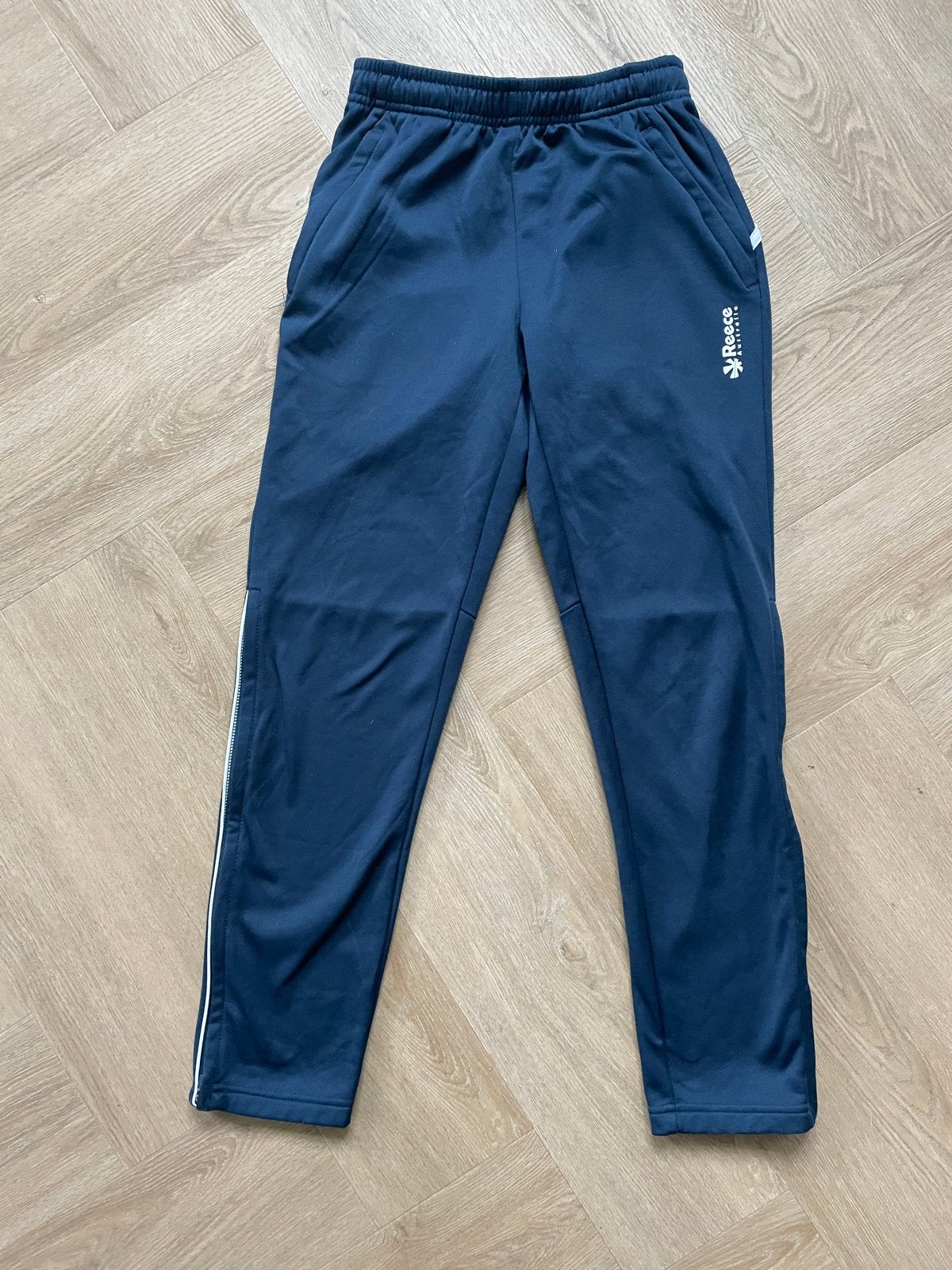 Reece trainingsbroek - Donkerblauw maat 140, Kinderen en Baby's, Kinderkleding | Maat 140, Verzenden, Zo goed als nieuw, Jongen of Meisje
