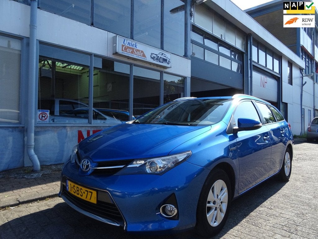 Toyota Auris Touring Sports 1.8 Hybrid Aspiration, Auto's, Euro 5, Gebruikt, Blauw, Origineel Nederlands