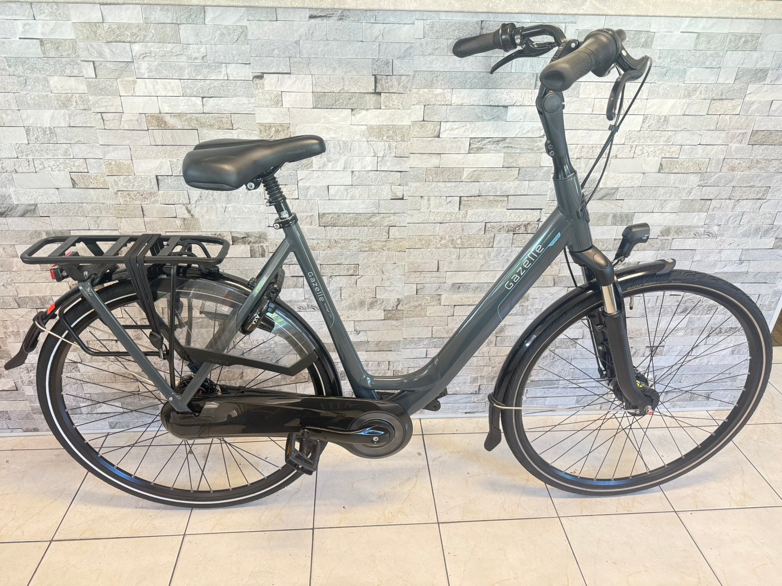 NIEUWSTAAT-Gazelle Oranje Damesfiets D57cm. V7. 1jaar oud., Ophalen, Versnellingen, 56 cm of meer, Zo goed als nieuw