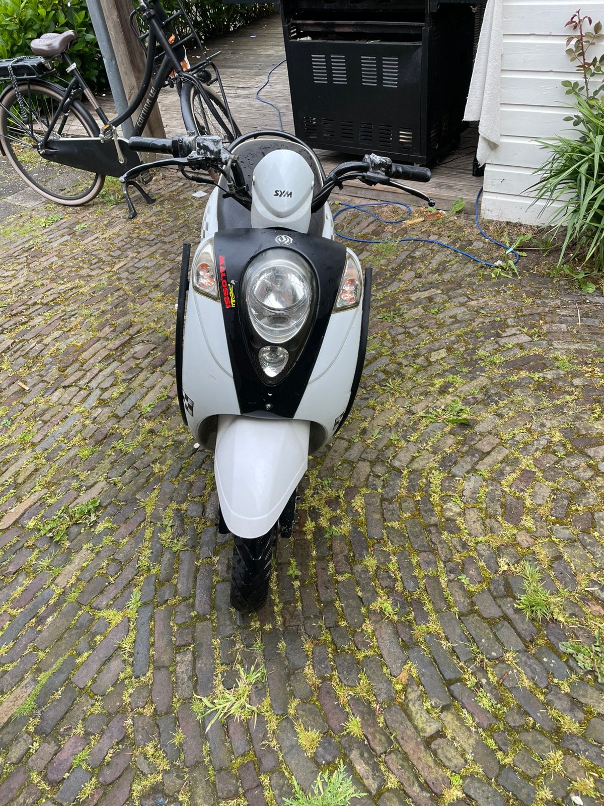 Sym mio 2x MOET WEG!, Ophalen, Gebruikt, Blok