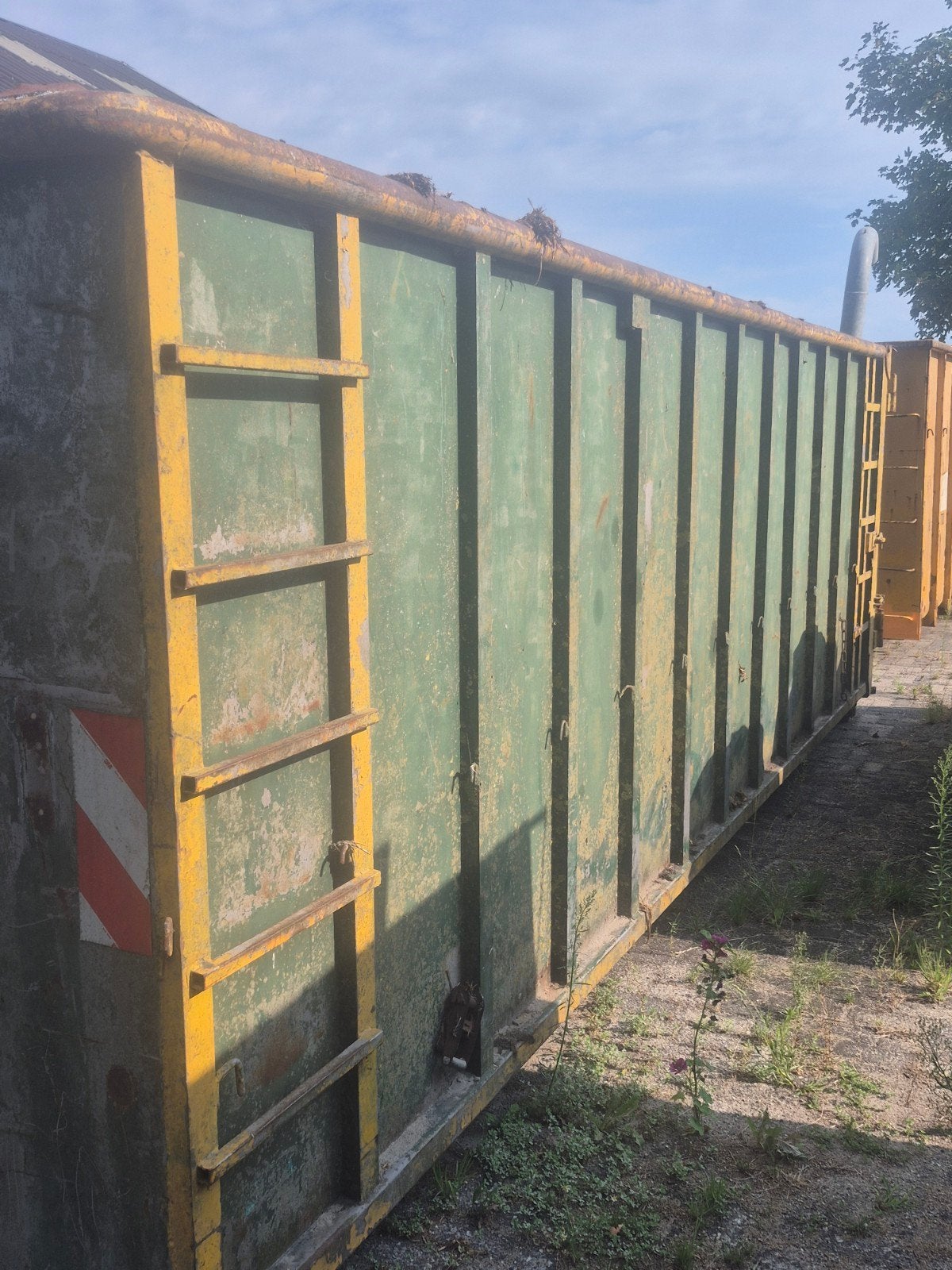 Gebruikte afzetcontainer -haakarm container, Ophalen