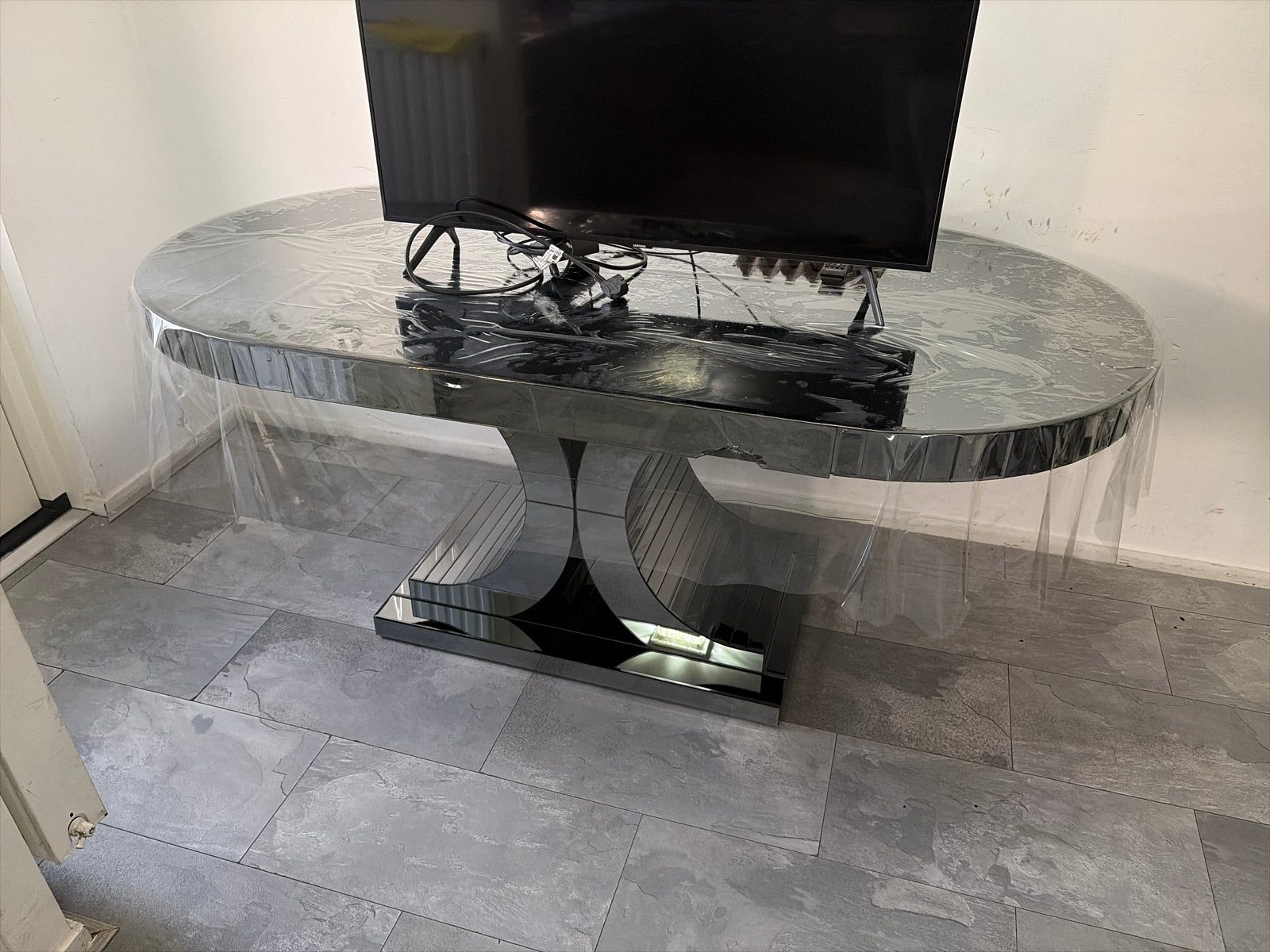 Ovale spiegel salontafel met lichte beschadigingen, Huis en Inrichting, Ophalen, Minder dan 45 cm, Gebruikt, Glas