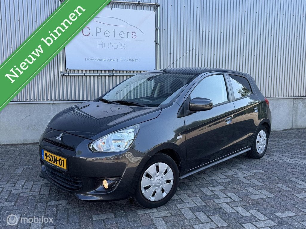 Mitsubishi Space Star 1.2 80pk Invite 2014 5deurs / Airco /, Auto's, Mitsubishi, Euro 5, Stof, Gebruikt, 200 kg