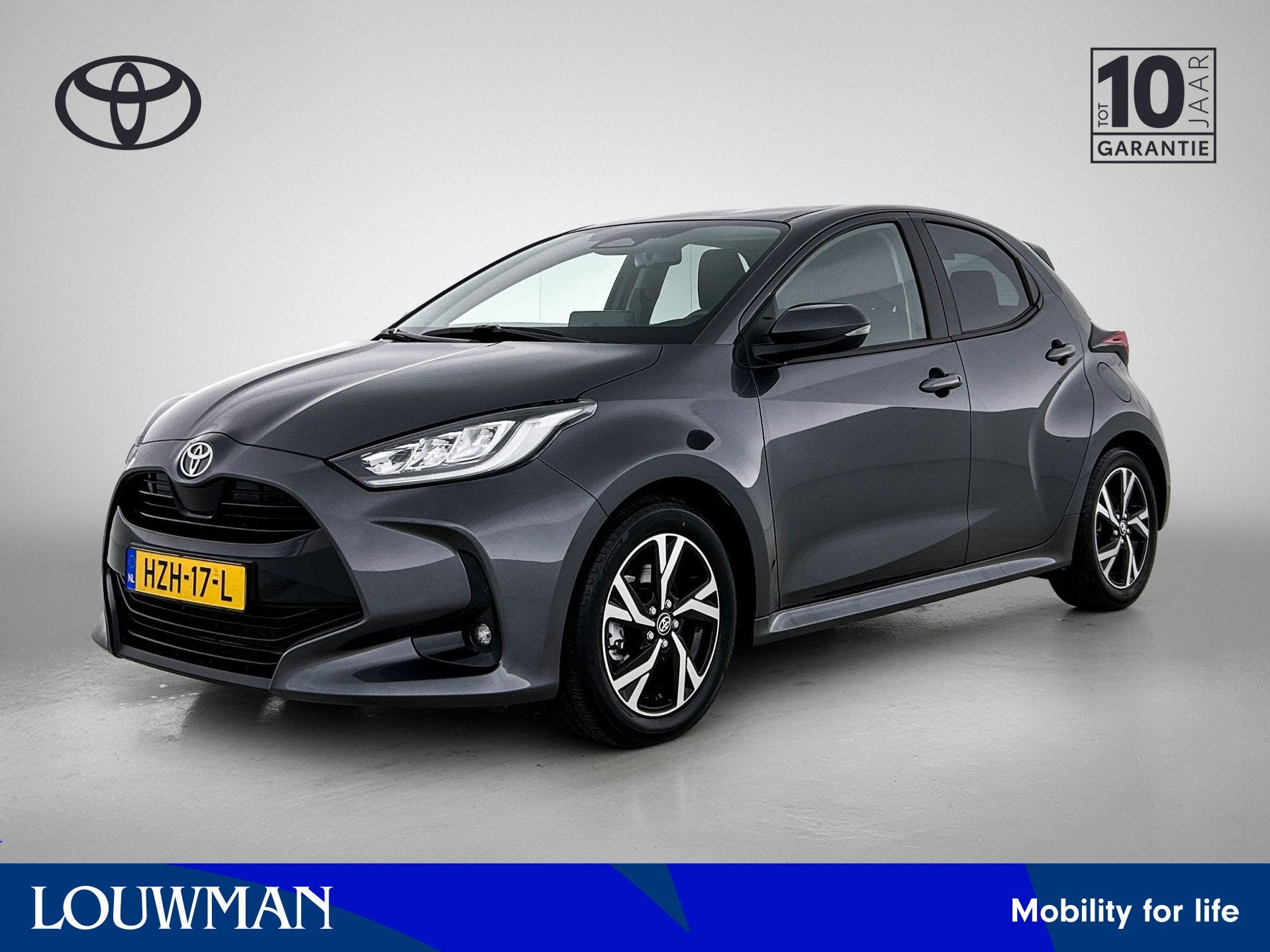 Toyota Yaris 1.5 Hybrid 115 Dynamic | Velgen | Navigatie, Auto's, 12 maanden, Gebruikt, Hybride Elektrisch/Benzine, 3 cilinders