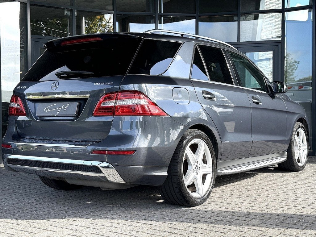 Mercedes-benz M-KLASSE 350 BLUETEC - AMG PAKKET - LUCHTV. -, Auto's, Automaat, Navigatiesysteem, Gebruikt, Euro 6