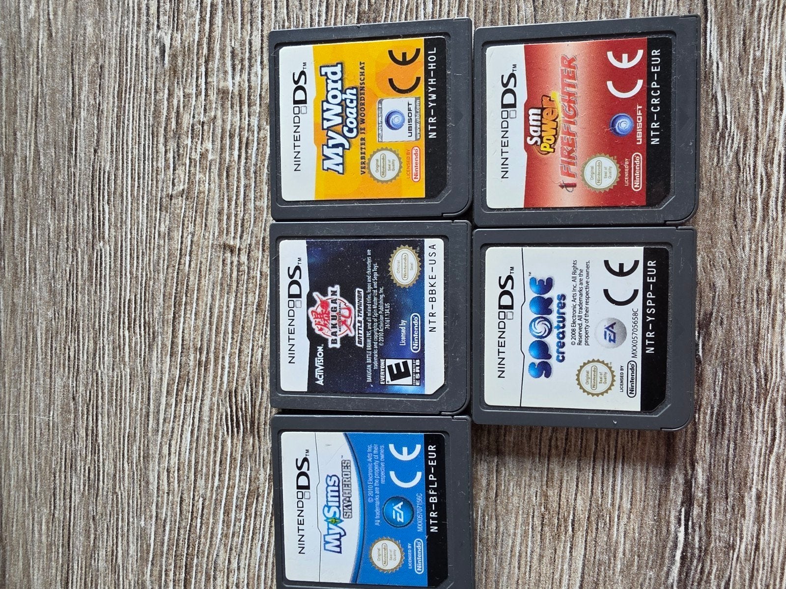 Nintendo DS Lite (zwart) en Nintendo DS (roze) met games, Spelcomputers en Games, Ophalen of Verzenden, Roze, DS Lite, Met games