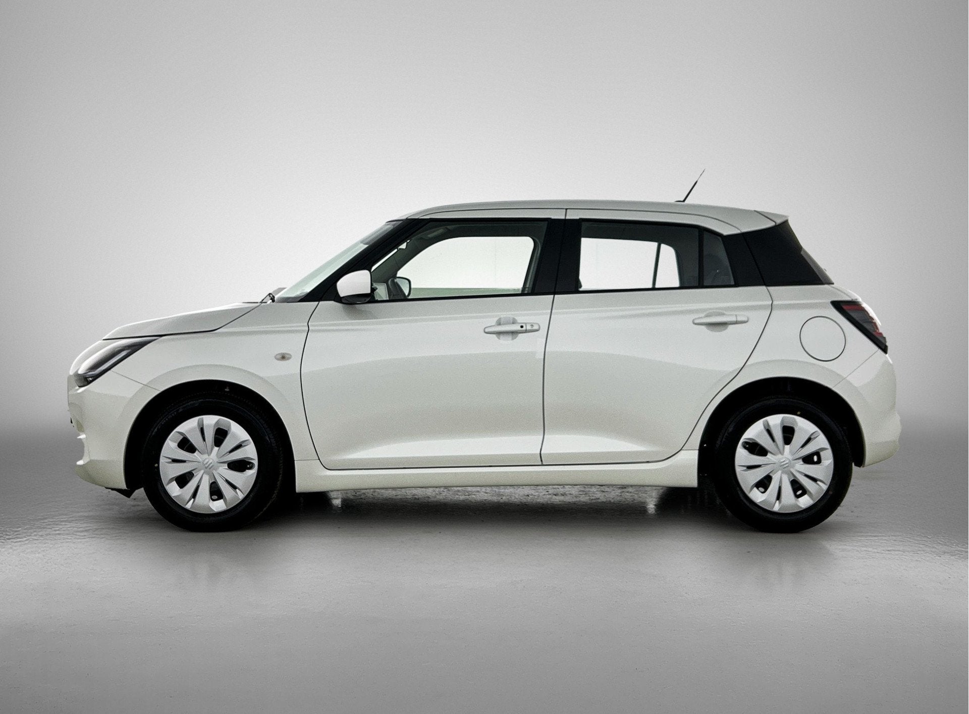 Suzuki Swift 1.2 Comfort Smart Hybrid (bj 2026), Voorwielaandrijving, Stof, 400 kg, Origineel Nederlands