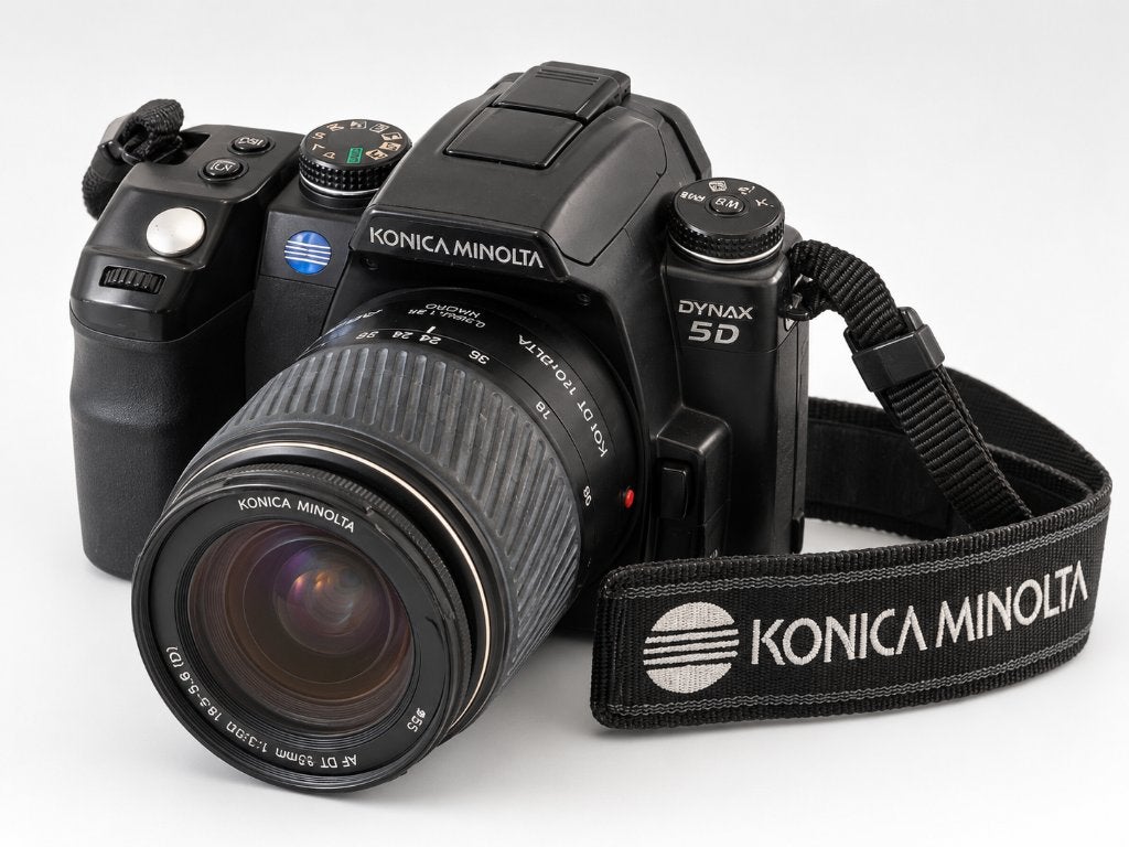 Konica Minolta Dynax 5D DSLR + 18-70mm lens + tas + 2 accu’s, Gebruikt, Spiegelreflex, Konica, Ingebouwde flitser