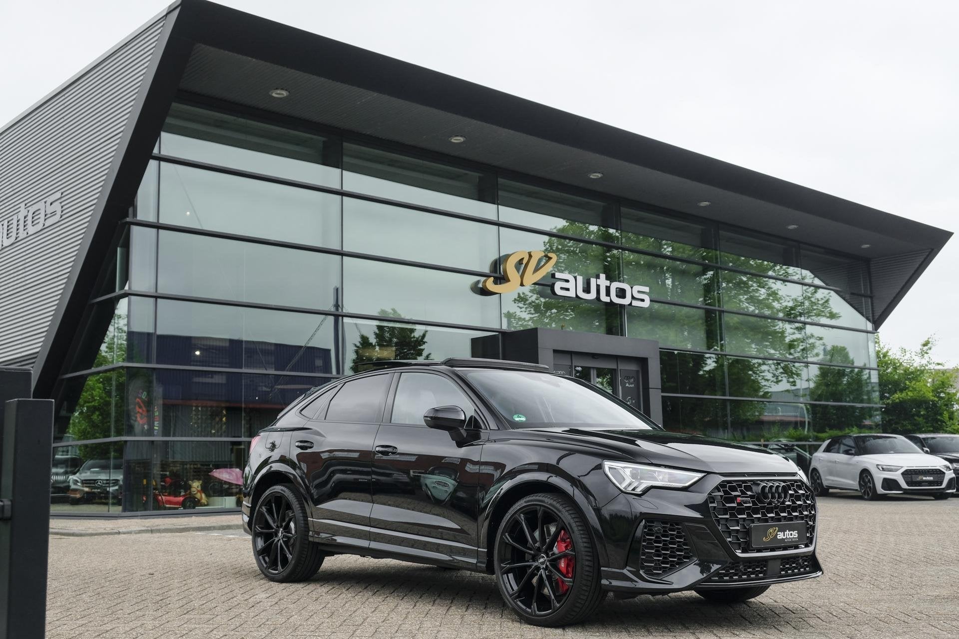 Audi RSQ3 Sportback TFSI 400pk Panoramadak Sonos Trekhaak 21, Automaat, Gebruikt, 1675 kg, Zwart