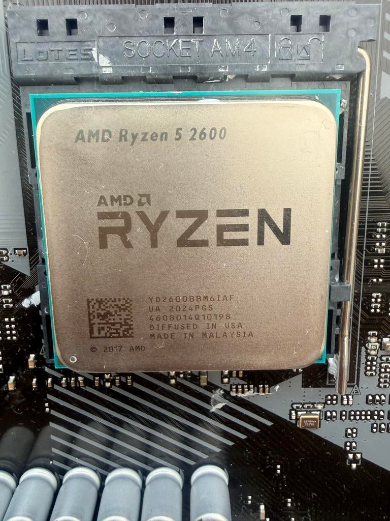 AMD Ryzen 5 2600 processor met koeler, Computers en Software, Processors, Ophalen of Verzenden, Zo goed als nieuw, 6-core, 3 tot 4 Ghz