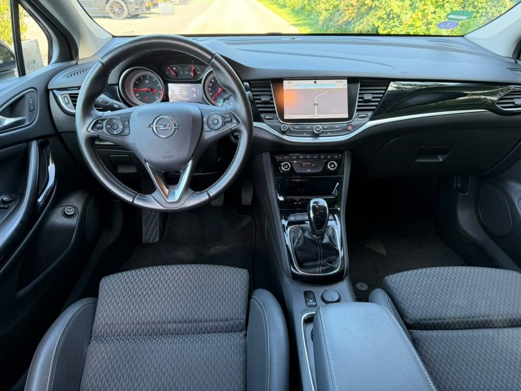 Opel Astra Sports Tourer 1.4 Innovation 150 PK | Camera | Tr, Auto's, Gebruikt, Euro 6, 4 cilinders, 150 pk
