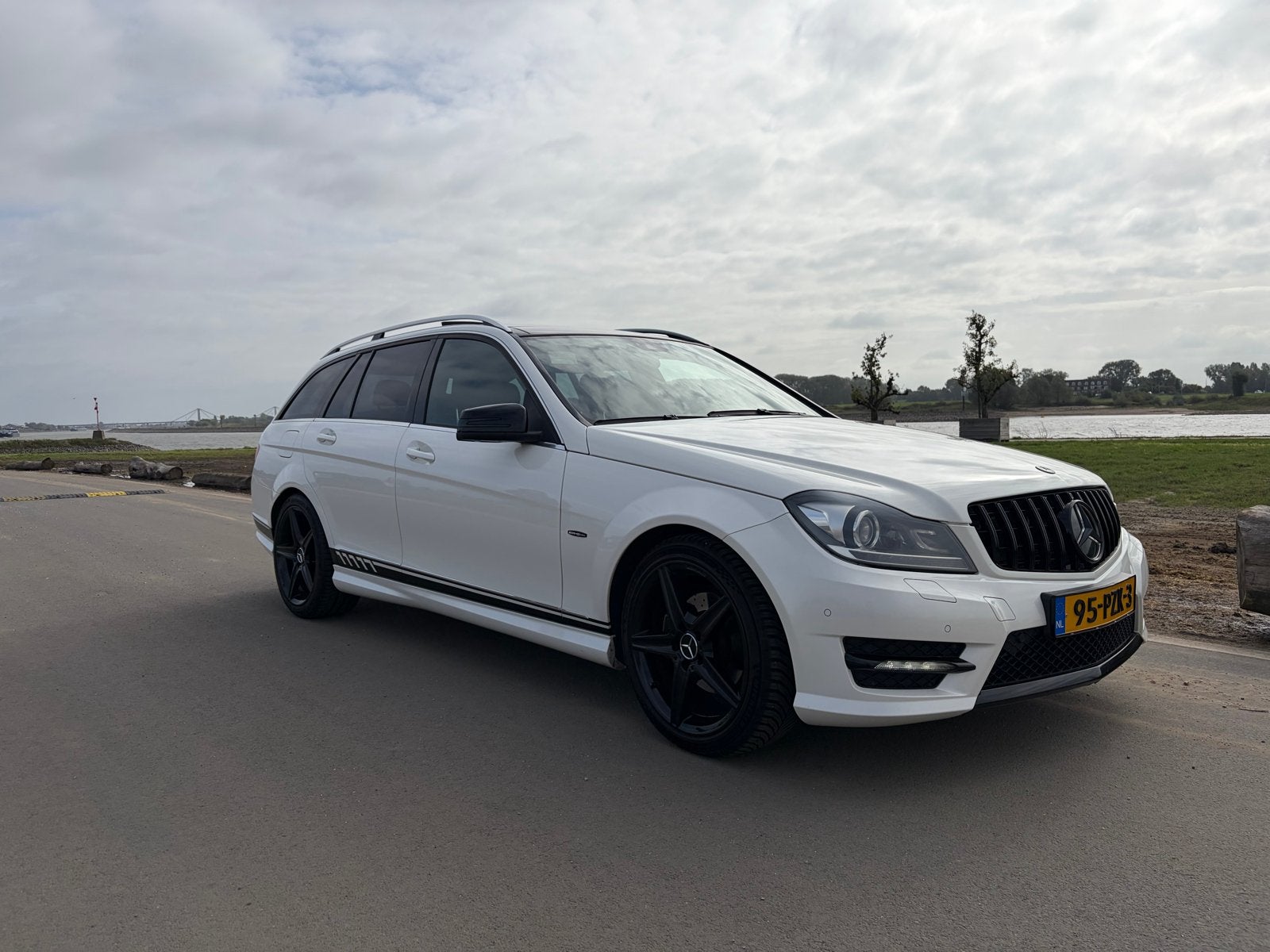 Mercedes-Benz C-Klasse 1.8 C180 CGI Estate AUT 2011 Wit, Auto's, Automaat, Achterwielaandrijving, 1800 kg, Zwart