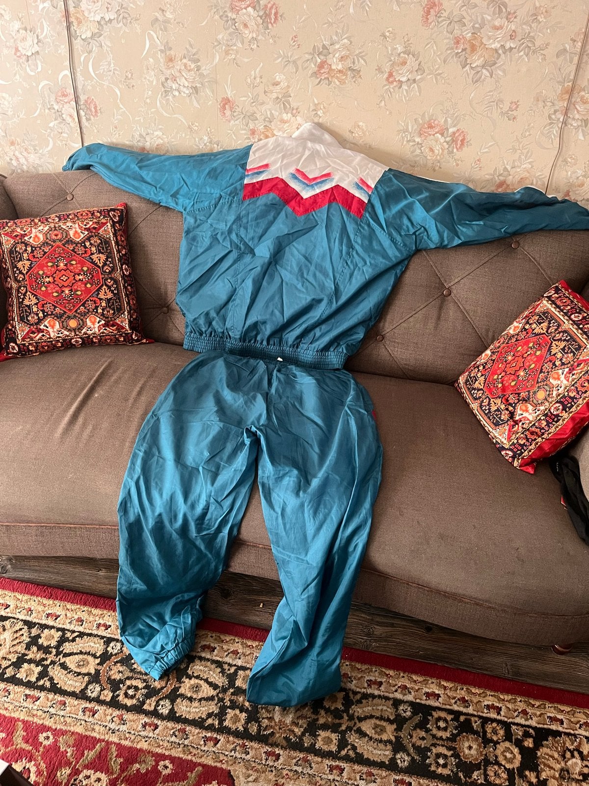 Vintage trainingspak in turquoise en rood, Ophalen