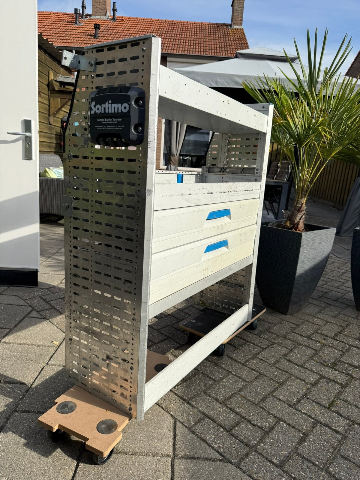 Sortimo gereedschap rek, Ophalen