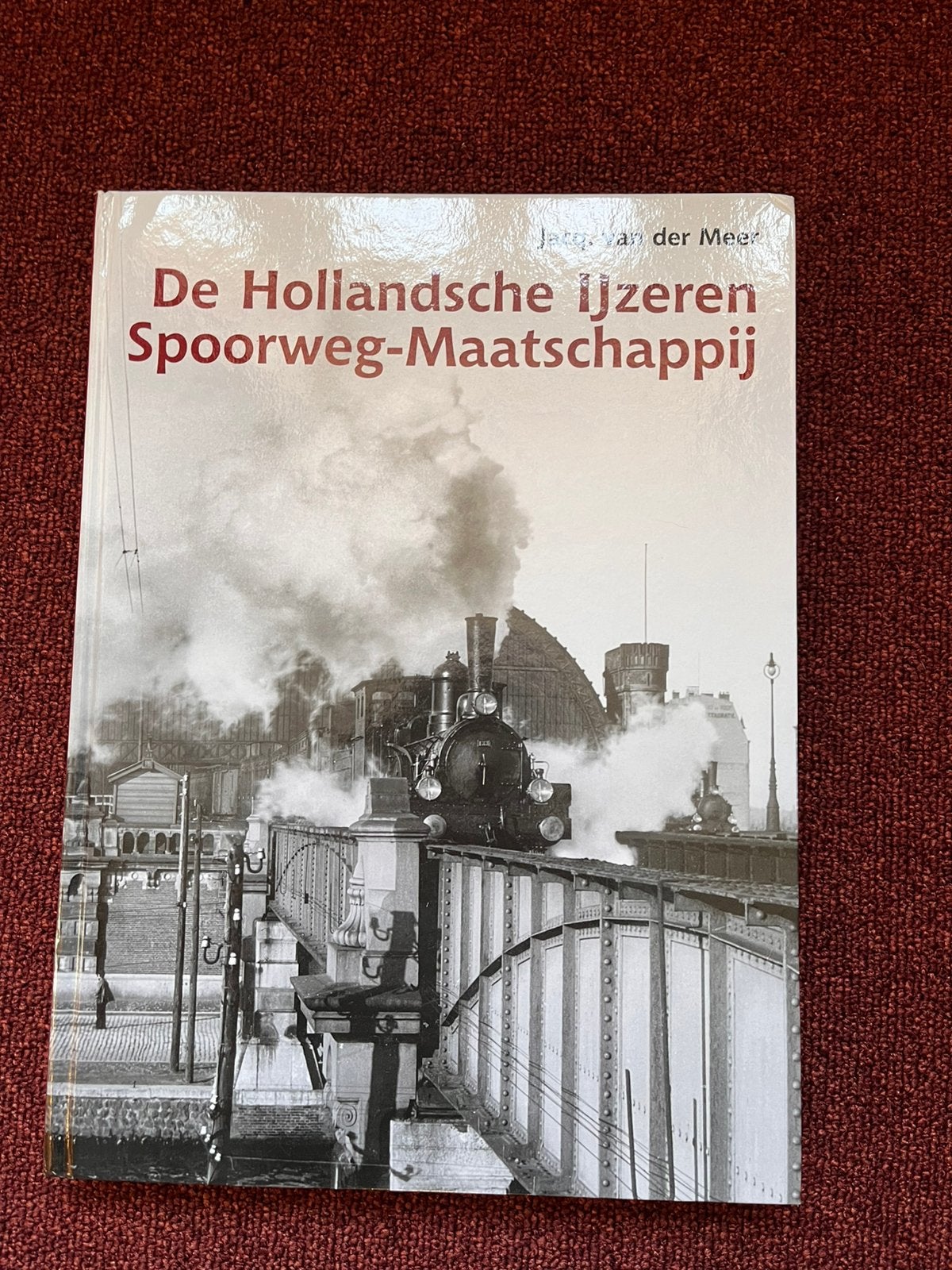 Boek De Hollandsche IJzeren Spoorweg-Maatschappij, Ophalen of Verzenden, Zo goed als nieuw