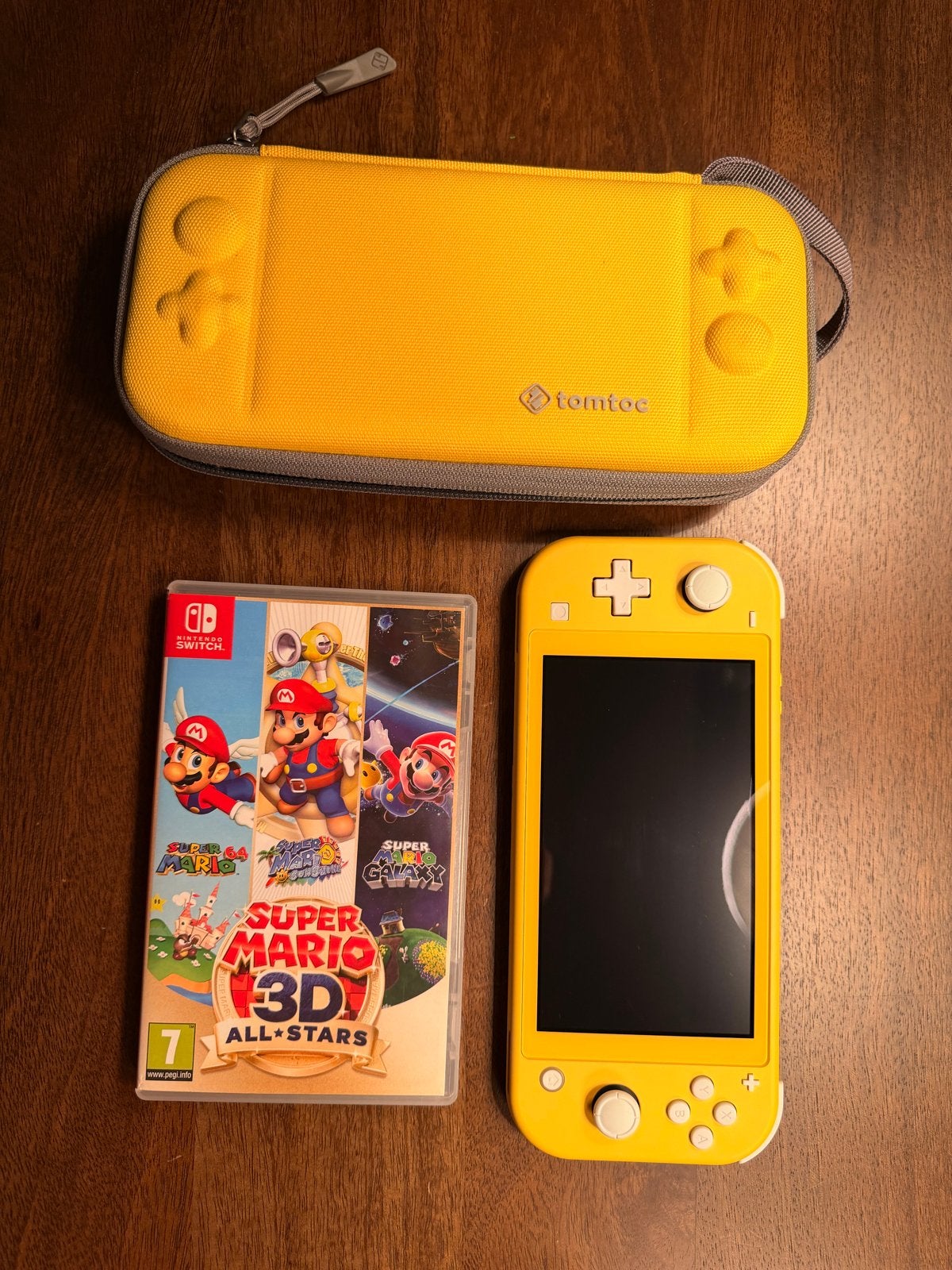 Nintendo Switch Lite Geel met Super Mario 3D All-Stars, Ophalen, Met games, Zo goed als nieuw, Zonder controller
