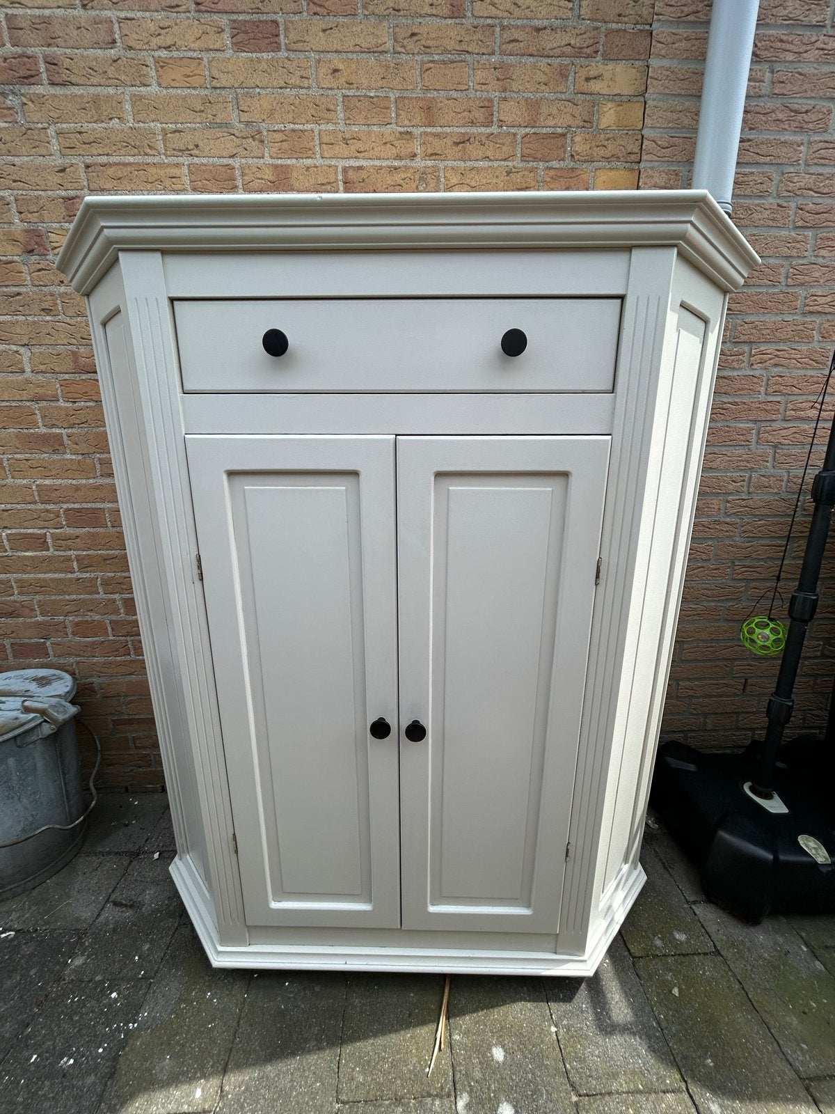Antieke kast met lade en openslaande deuren, Ophalen