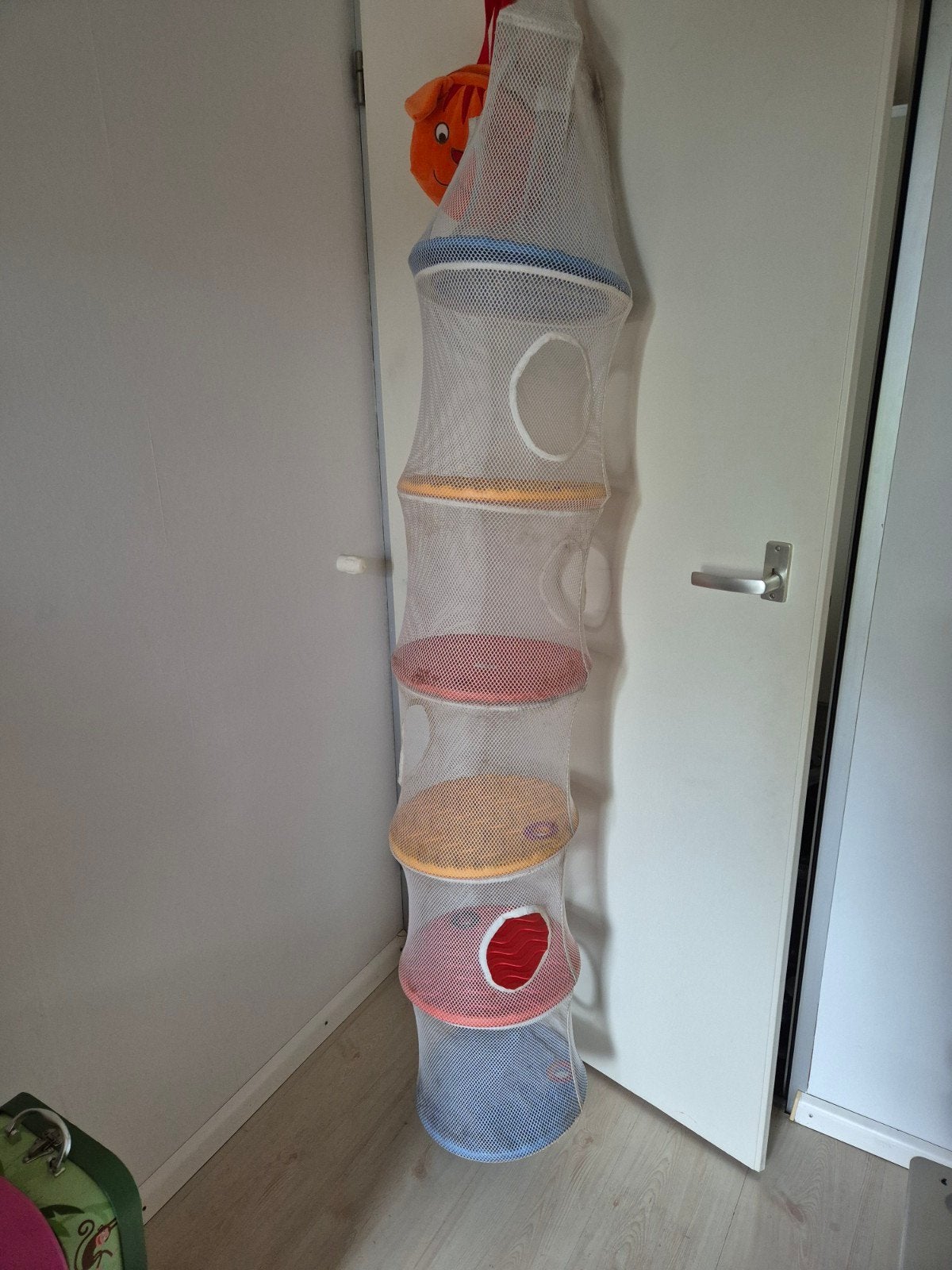 Opbergnet voor tent of caravan, Ophalen