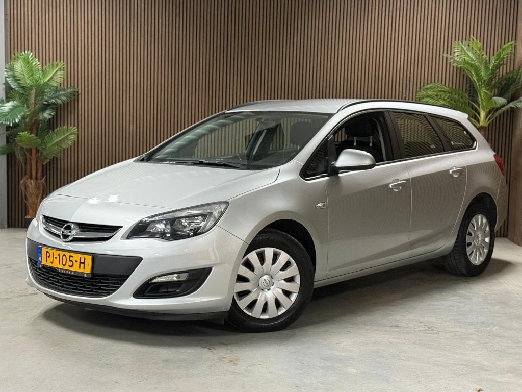 Opel Astra Sports Tourer 1.4 Turbo Edition (bj 2015), Auto's, Opel, Stof, Gebruikt, Euro 6, 4 cilinders