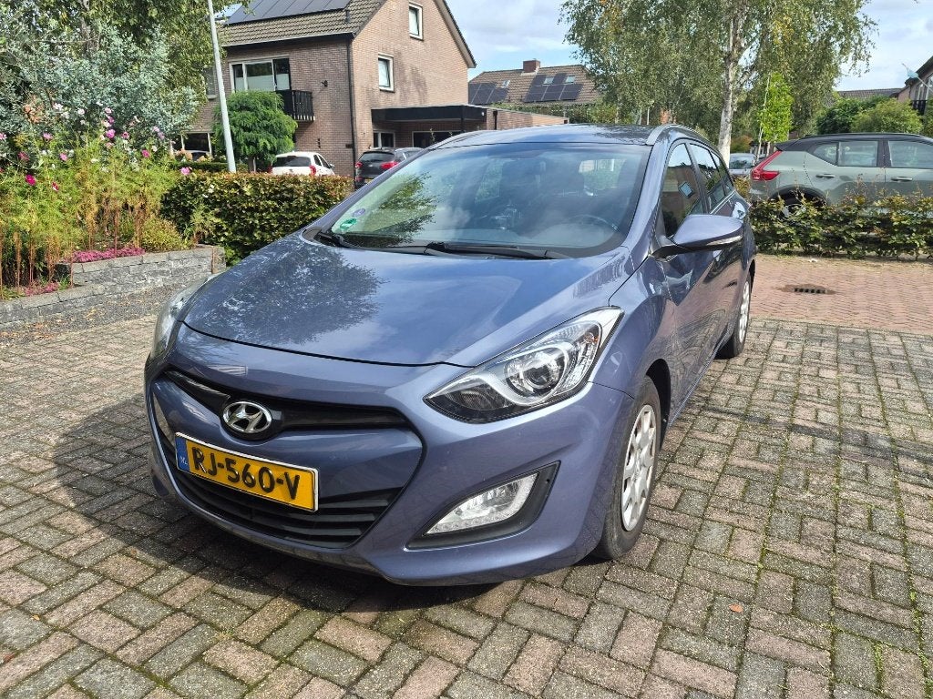 Hyundai i30 1.4 I Cvvt Crosswagon Blauw (bj 2012), Voorwielaandrijving, Zwart, 4 cilinders, 1396 cc