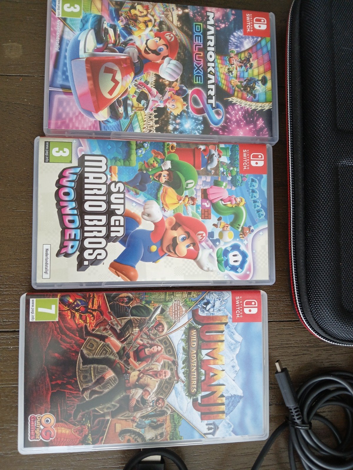 Foto 5 van Nintendo Switch OLED met 3 games en accessoires