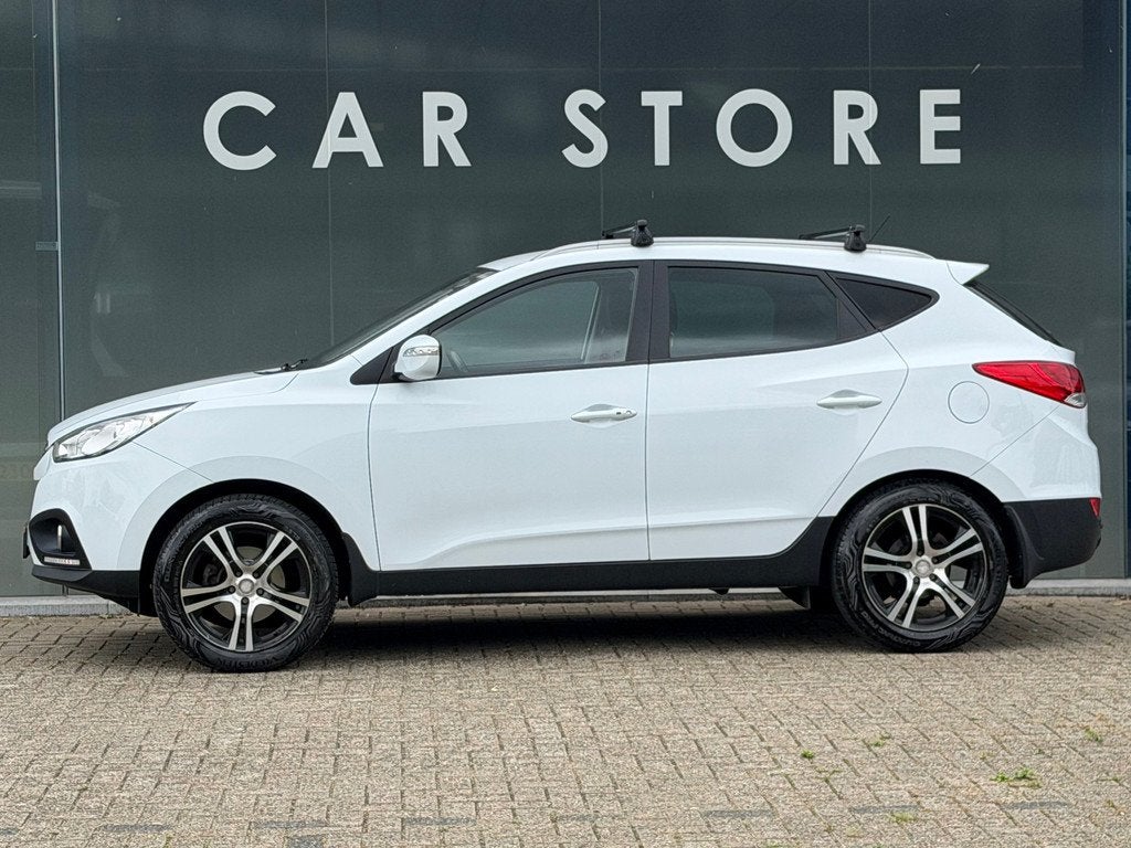 Hyundai Ix35 2.0i Style TREKHAAK|CRUISECONTROL|PDC|AIRCO, Auto's, Hyundai, Gebruikt, Zwart, 4 cilinders, Leder en Stof