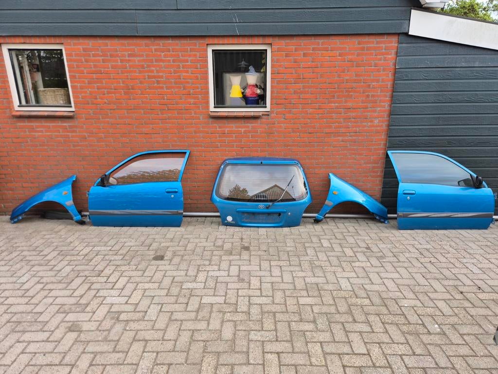 Toyota Starlet P9 plaatwerk blauw, Auto-onderdelen, Ophalen, Gebruikt, Voor, Spatbord